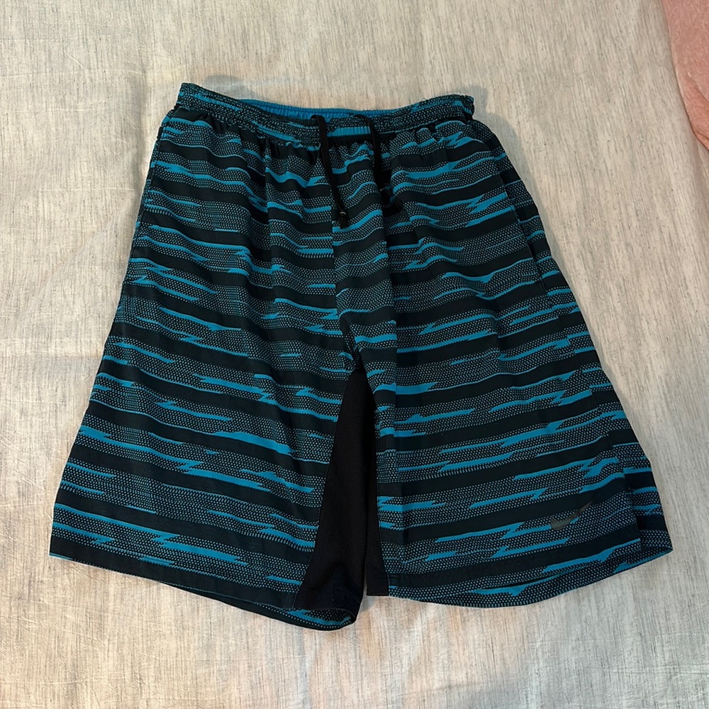Nike men’s small running shorts, blue and black